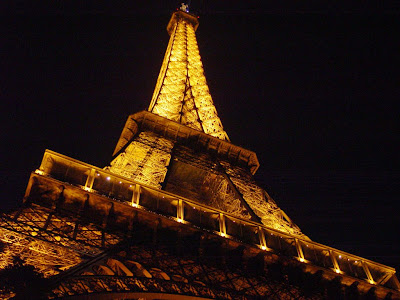 The Eiffel Tower at night. 